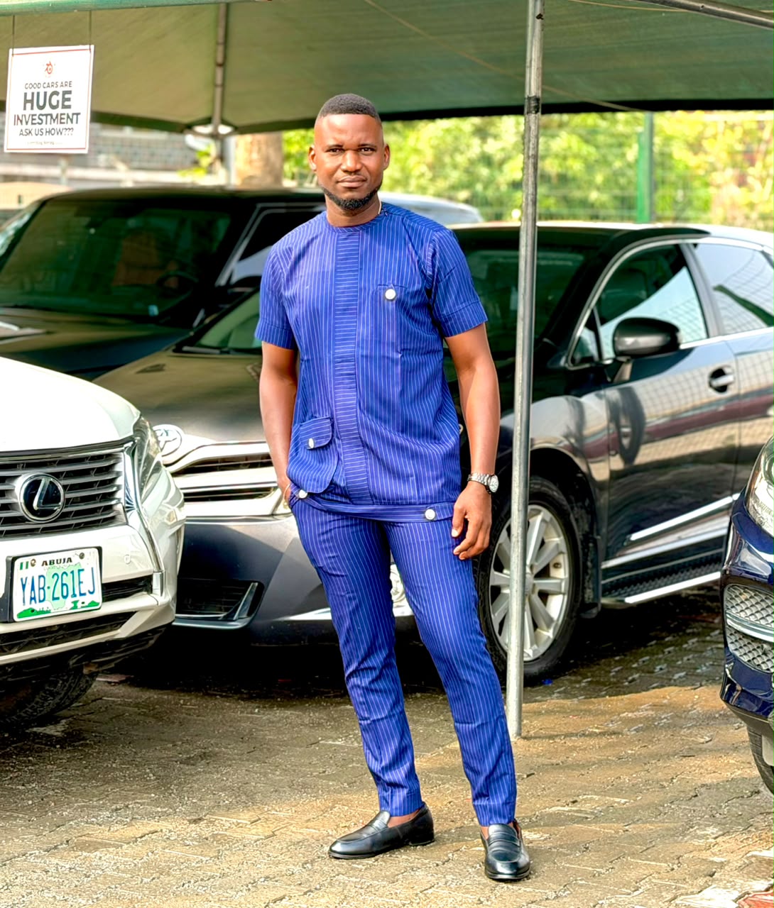 Anthony Ayodele standing outdoors in Abuja
